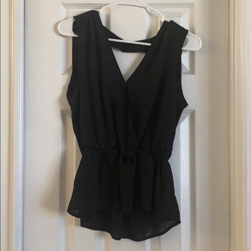 Black sleeveless blouse